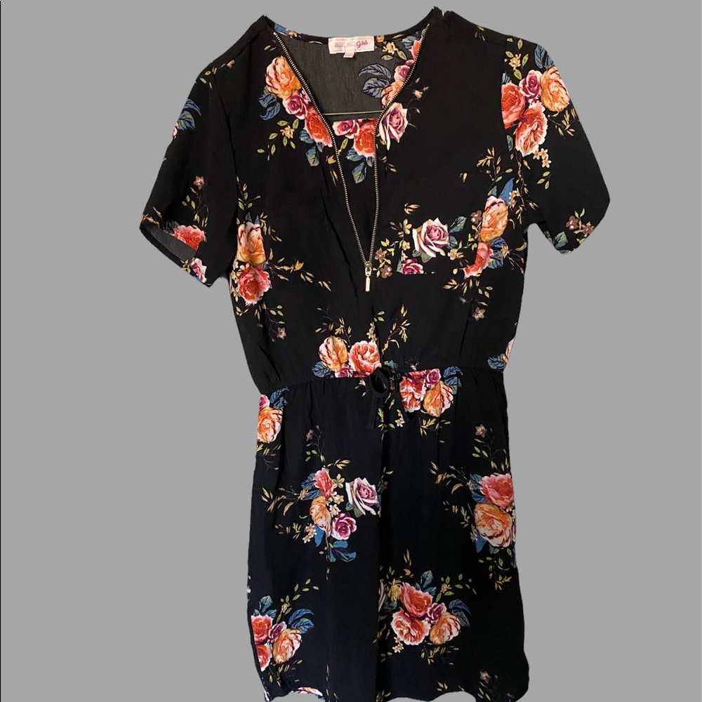 Stella tweed black dress with roses around it
